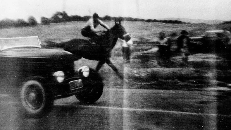 Thumbnail of a car racing a horse