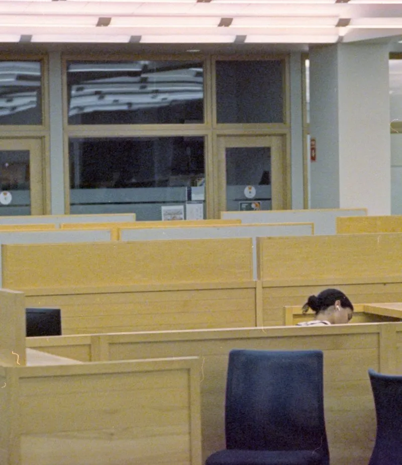 Blurred office interior with cubicle partitions
